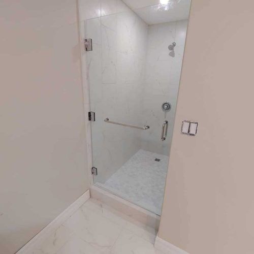 glass shower door with metal handle